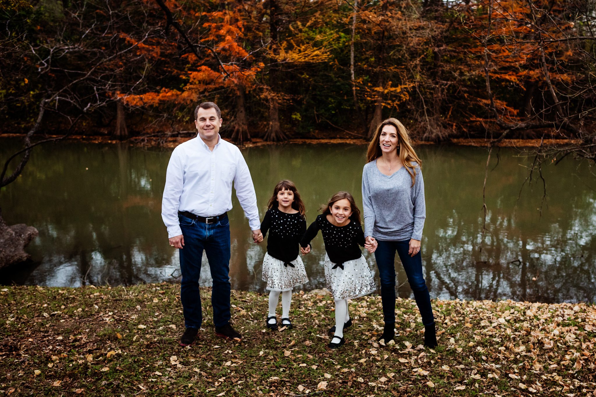 Beautiful Family in Fall Leaves