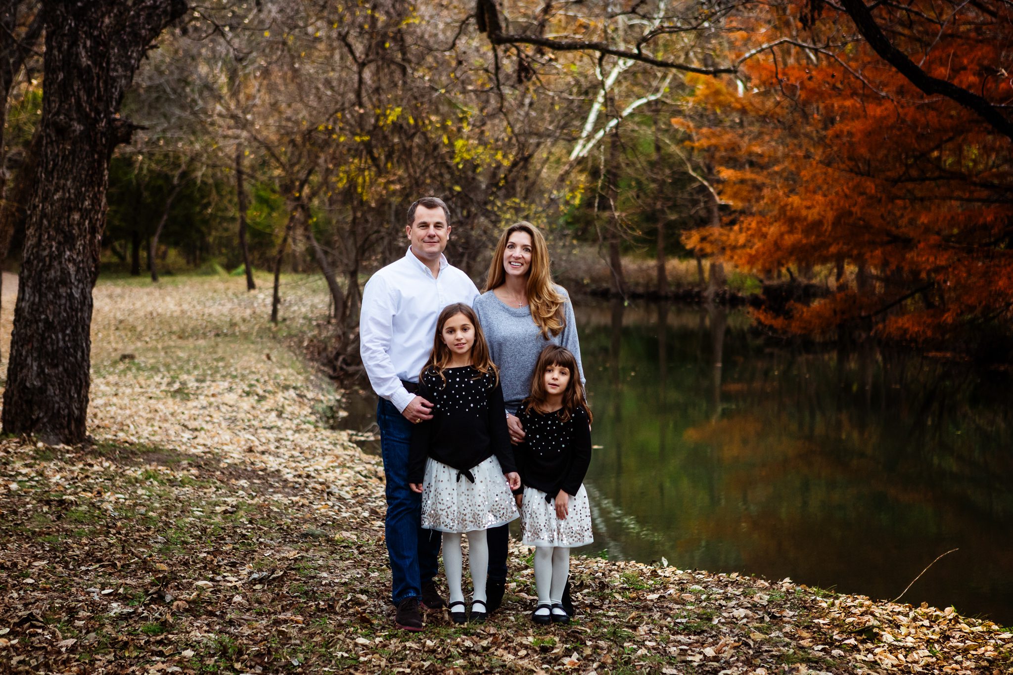 Beautiful Family in Fall Leaves