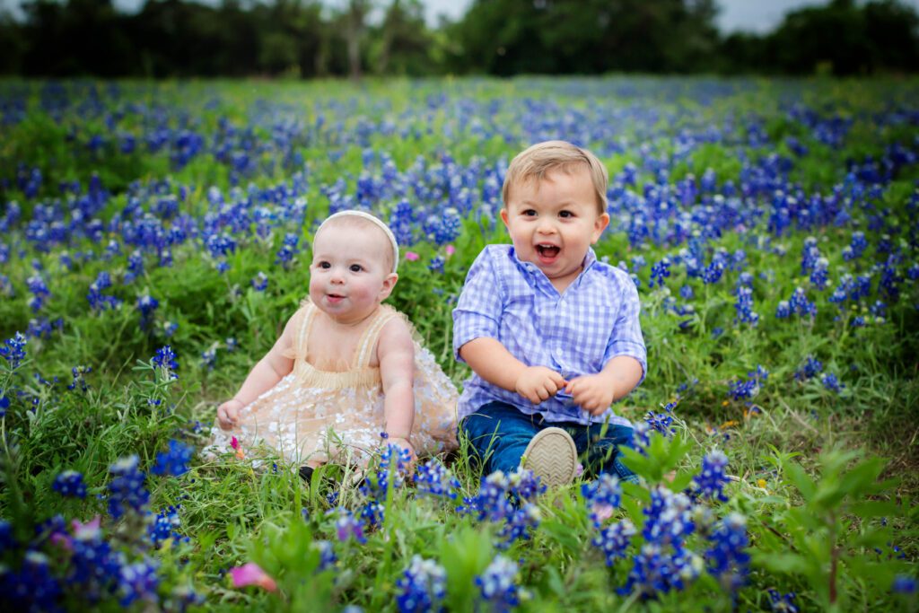 spring flowers with toddlers sitting in them